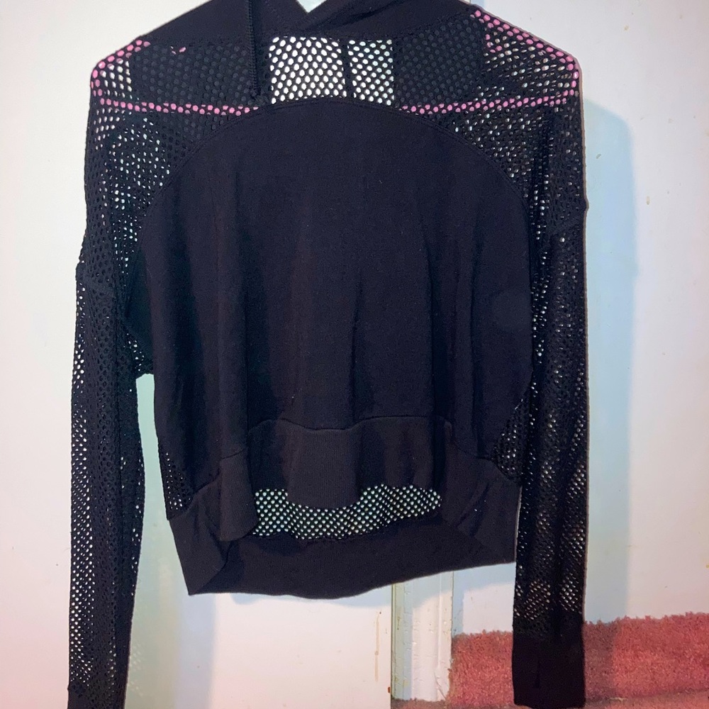 Black Hoodie shirt with holes. From forever 21 size L girls.